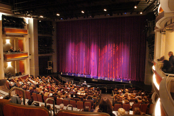 Photo of theater with audience